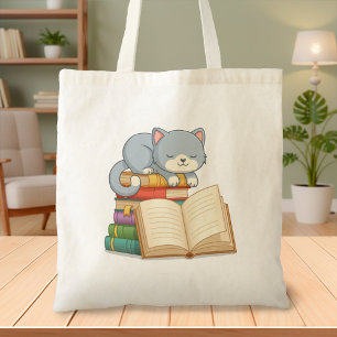 Süße Katze auf einem Bücherstapel Tragetasche