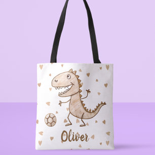 Süße kleine Dino spielt Fußball personalisiert