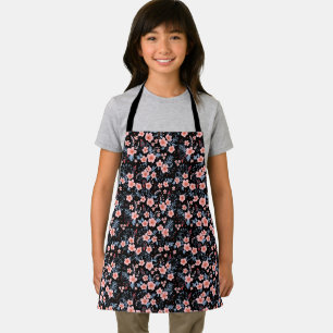 Süße kleine rosa Blumengestaltung mit schwarzem Hi Schürze