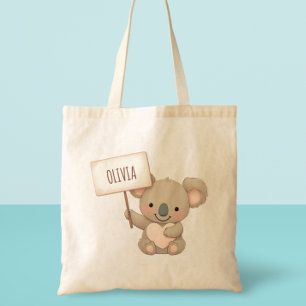 Süße Koala hält ein Namensschild Tragetasche