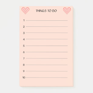 Süße korallenrosa und weiße Herzen auf hellrosa Post-it Klebezettel