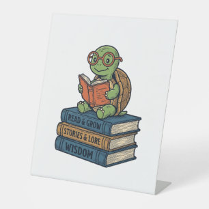 Süße lesende Schildkröte auf Büchern Vintage Vekto Sockelschild
