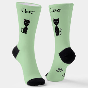Süße lustige schwarze Katze & Pfoten auf hellgrün Socken