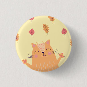 Süße orangefarbene Ingwerkatze spielt im Herbstlau Button