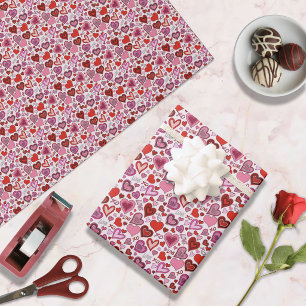 Süße rosa rote Herzen Errötungsliebesmuster Geschenkpapier