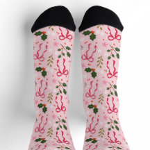 Süße rosa Weihnachtsstrümpfe mit Stechpalme