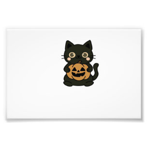 Süße schwarze Katze hält Jack O Lantern Kürbis � K Fotodruck