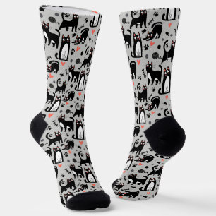 Süße schwarze Katze nahtloses Muster auf einem hel Socken