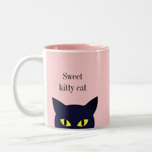 Süße schwarze Katzenfratze und Kalligrafie auf Ros Zweifarbige Tasse