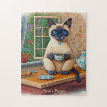 Süße siamesische Katze und Teetassen-Puzzle