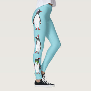 Süße Weihnachts-Gentoo-Pinguine auf Blau Leggings