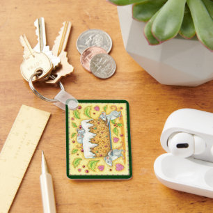 Süße Weihnachtsmäuse tragen einen Früchtekuchen-De Schlüsselanhänger