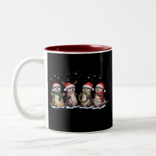 Süße Weihnachtsotter in Santa-Hüten Lustiges Tier Zweifarbige Tasse