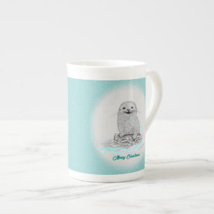 Süße weiße Baby-Seeeotter, Frohe Weihnachten Prozellantasse