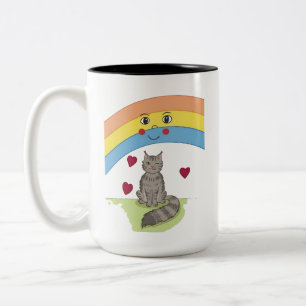 Süße zwinkernden Katze unter lächelndem Regenbogen Zweifarbige Tasse