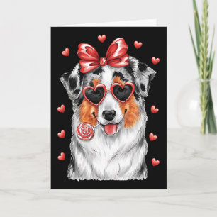 Süßer Australian Shepherd leckt Lutscher Valenti Karte