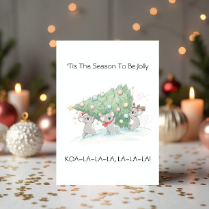 Süßer australischer Koala trägt Weihnachtsbaum Feiertagskarte