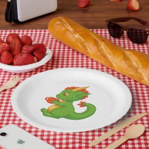 Süßer Baby-Drache hält Tasse Pappteller