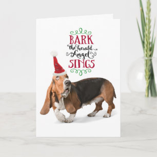 Süßer Basset Hound mit Weihnachtsmannmütze zum Fei Feiertagskarte