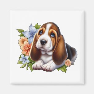 Süßer Basset Hound Welpe sitzt mit Blumen Magnet
