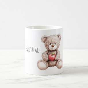 Süßer cremefarbener Teddybär aus Strick mit Apfel Kaffeetasse