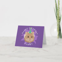 Süßer Geburtstags-Hamster, der durch ein Loch scha
