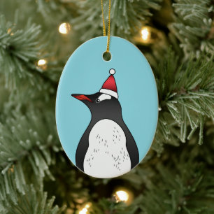 Süßer Gentoo-Pinguin mit Santa-Hut auf Blau Keramik Ornament