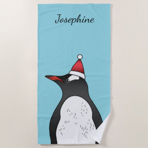 Süßer Gentoo-Pinguin mit Santa-Hut auf Blau Strandtuch