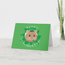Süßer Hamster zum St. Patrick's Day, der durch ein