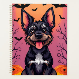Süßer Hund in einer Halloween-Szene mit Kürbissen Planer