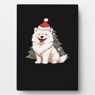 Süßer Hund mit Weihnachtsmannmütze und Weihnachtsb Fotoplatte