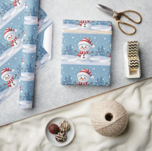 Süßer kleiner Schneemann mit Schal und Hut Geschenkpapier
