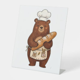 Süßer Krayon-Bäckerbär mit französischem Brot Chef Sockelschild