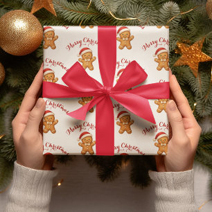 Süßer Lebkuchenmann mit Weihnachtsmannmütze - Geschenkpapier