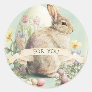 Süßer Osterhase mit Blumen und einem Ei Runder Aufkleber