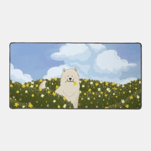 Süßer Samojede-Hund auf einem Feld gelber Blumen ( Schreibtischunterlage