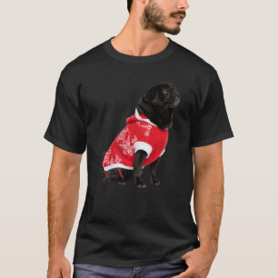 Süßer schwarzer Pug Santa-Hut roter Pullover Bild