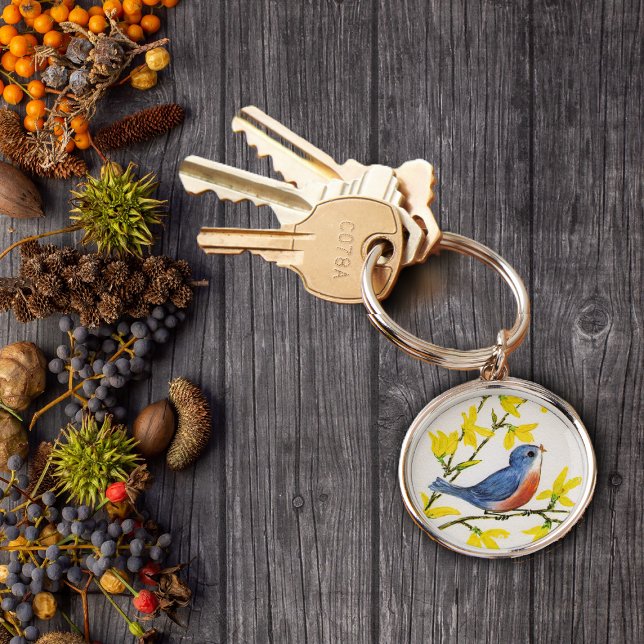 Süßer singender blauer Vogebaum Schlüsselanhänger (Cute blue and red singing bird on branch yellow flowers on keychain.)