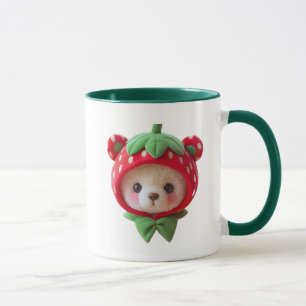 Süßer Teddybär mit Erdbeerkapuze. Tasse