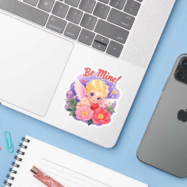 Süßer Valentinstag-Cupid mit "Sei mein" Aufkleber (Laptop mit iPhone)