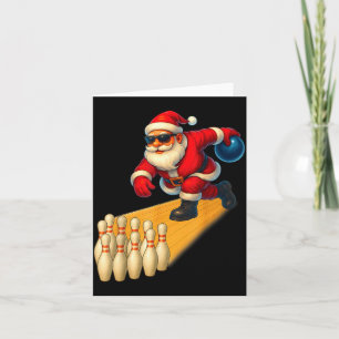 Süßer Weihnachtsmann spielt Bowlingkugel und Ns Bo Karte