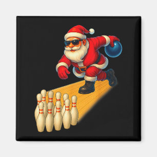 Süßer Weihnachtsmann spielt Bowlingkugel und Pins Magnet