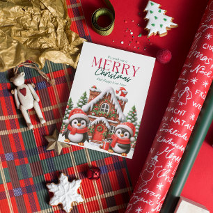 Süßer Weihnachtspinguin und Lebkuchenhäuschen Feiertagskarte