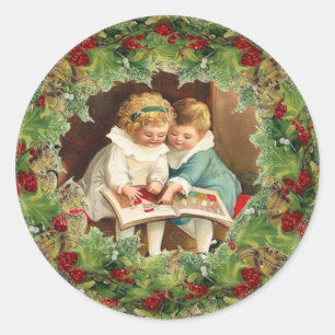 Süßer Weihnachtssticker Kinder beim Lesen Runder Aufkleber