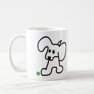 Süßer Welpe mit einem grünen Ball Kaffeetasse