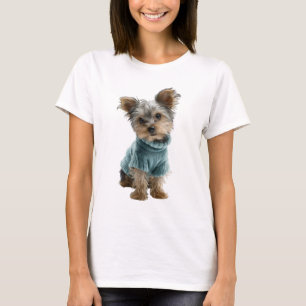 Süßer Yorkshire-Terrier-Welpe in blauem Pullover