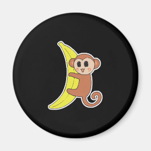 süßes Babyäffchen auf Banane Magnet