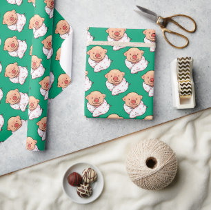 Süßes Babyferkel eingewickelt in eine Decke Geschenkpapier