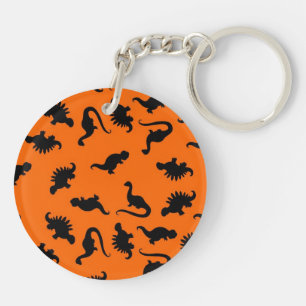 Süßes Dinosaurier-Muster auf Orange Schlüsselanhänger