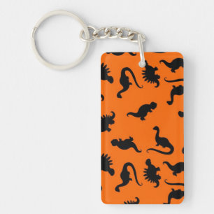 Süßes Dinosaurier-Muster auf Orange Schlüsselanhänger